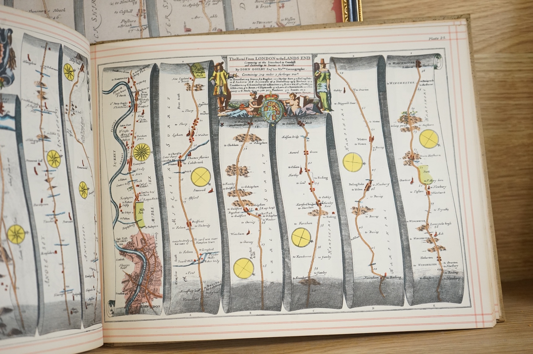 John Ogilby (1600-1676), hand coloured engraved road map, ‘Oxford to Coventry’ together with Britannia, volume the first or an illustration of the Kingdom of England and Dominion of Wales' by John Obilby, hardback book,